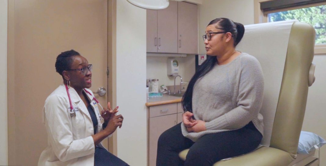Beebe Dr. Joyce Robert with patient medical school Sussex County